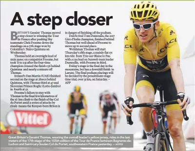  ??  ?? Great Britain’s Geraint Thomas, wearing the overall leader’s yellow jersey, rides in the last meters of the 17th stage of the 105th edition of the Tour de France between Bagneres-deLuchon and Saint-Lary-Soulan Col du Portet, southweste­rn France...