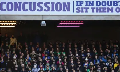  ?? Cardy/Sportsfile/Getty Images ?? A concussion awareness advert during the Six Nations match between Scotland and Ireland at Murrayfiel­d in 2019. Photograph: Ramsey