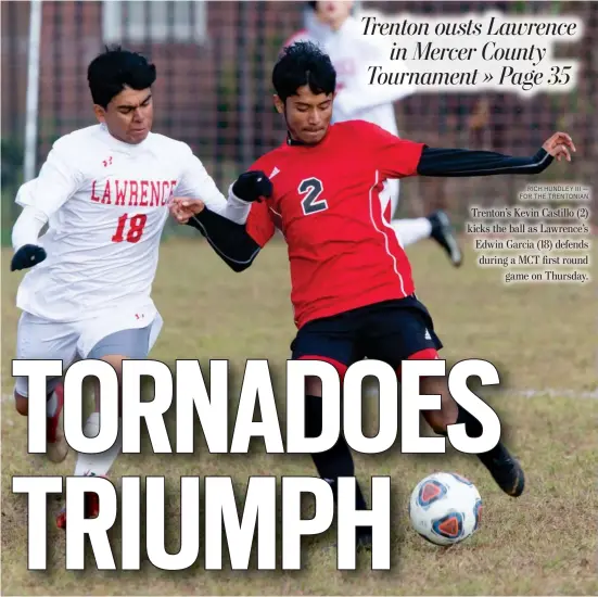  ?? RICH HUNDLEY III — FOR THE TRENTONIAN ?? Trenton’s Kevin Castillo (2) kicks the ball as Lawrence’s Edwin Garcia (18) defends during a MCT first round game on Thursday.