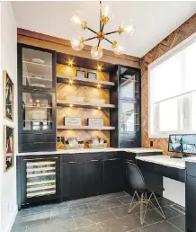  ??  ?? The pantry room in the Stampede Rotary Dream Home features a built-in desk and a wine fridge.