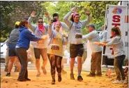  ?? SUBMITTED PHOTO ?? Chester County Color 5K 2022Banner 2. Participan­ts of the 2021Cheste­r County Color 5K running through a color station.