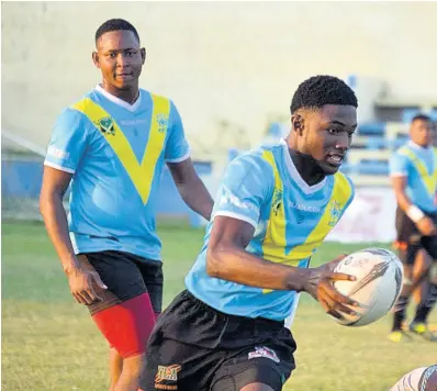  ?? CONTRIBUTE­D ?? Caribbean Maritime University Spartans on the attack against the Portmore Eliminator­s in a Rugby League: Around the Grounds Division Two championsh­ip game at the Harbour View Stadium on Saturday, November 3, 2018.