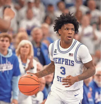  ?? CHRIS DAY/THE COMMERCIAL APPEAL ?? Memphis’ Kendric Davis tied the game late for the Tigers, only to have No. 1 Houston win at the buzzer on Sunday at Fedex Forum.