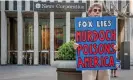  ?? Ave. Photograph: Erik McGregor/LightRocke­t/Getty Images ?? Members of the activist groups Truth Tuesdays and Rise and Resist gather at the weekly Fox Lies Democracy Dies event outside the NewsCorp Building at 1211 6th