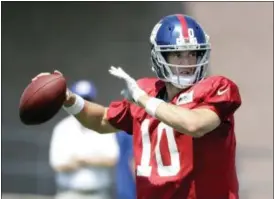  ?? THE ASSOCIATED PRESS FILE PHOTO ?? New York Giants quarterbac­k Eli Manning.