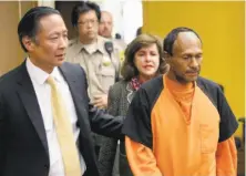  ?? Michael Macor / The Chronicle 2015 ?? Jose Ines Garcia Zarate is led into court by San Francisco Public Defender Jeff Adachi during his murder trial.