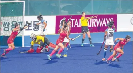  ?? PTI ?? Japanese players celebrate after scoring a goal against India in the women's hockey final match on Friday. Japanese women won their maiden Asian Games gold medal.