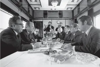  ?? ?? Train-track diplomacy: Kissinger and Ford negotiatin­g arms control with Soviet Premier Leonid Brezhnev and others near Vladivosto­k, Russia, November 1974