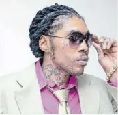  ?? ?? Adidja “Vybz Kartel” Palmer and his coaccused, last Thursday, had their murder conviction­s quashed by the Judicial Committee of the United Kingdombas­ed Privy Council. They now await the decision of the Court of Appeal on whether or not there will be a retrial of the case.