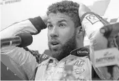  ?? PHELAN M. EBENHACK/ASSOCIATED PRESS ?? An emotional Bubba Wallace speaks to reporters after finishing second in the Daytona 500 on Sunday.