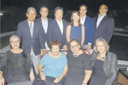  ??  ?? Soon-to-be-installed Canadian Senator Dr Rosemary Moodie (front, second right) shares the frame with mom Gloria (front, second left), sisters Andrea Chin-see (front left) and Margaret Jervis (front right) and family members (from, back left) brother-in-law WK Chin-see, son Nicholas Wong, husband Dr Peter Wong, future daughter-in-law Anna Easty, son Dr Jonathan Wong and brother-in-law Peter Jervis.