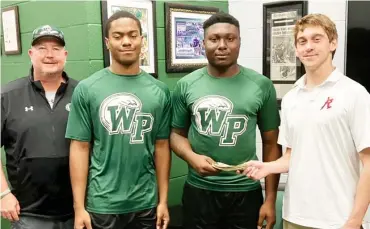  ?? ?? Jack Easterling, right, enjoys helping those in the West Point community and supports West Point High School football head coach Chris Chambless, from left, and players Bryson Wells and Qunterion Tillman-Evans. (Submitted photo)