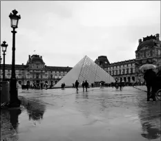  ?? AP Photo/Christophe Ena ?? The Louvre museum is pictured in Paris, Monday. The Louvre Museum was closed again Monday as management was meeting with staff worried about the spread of the new virus in the world’s most-visited museum.