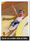  ??  ?? Oscar on a water slide at Siblu