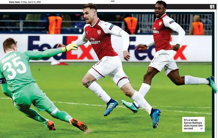  ?? AP ?? It’s a wrap: Aaron Ramsey slots home the second