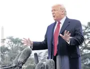  ??  ?? HOPES TO AVOID ARMS RACE: US President Donald Trump talks to reporters as he departs on campaign trail to Charleston, South Carolina on Friday.