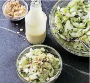  ?? [PHOTO BY STEVE KLISE, AMERICA’S TEST KITCHEN/AP] ?? This cucumber salad with creamy roasted garlic dressing appears in the cookbook “Just Add Sauce.”