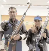  ?? PTI ?? Ravi Kumar ( left) and Apurvi Chandela pose after winning the bronze in Palembang on Sunday. —