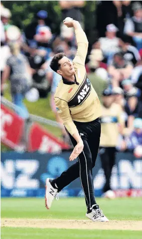  ?? PHOTO: GETTY IMAGES ?? On his game . . . Black Caps spinner Mitchell Santner about to release the ball during his stint at the bowling crease against Australia yesterday. Santner took four wickets, three of them in one over.