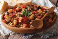  ?? GETTY IMAGES ?? Caponata, a sweet and tangy mixture of eggplant, tomatoes, olives and other vegetables, is common in southern Italy.