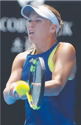  ?? Picture: AFP & MICHAEL KLEIN ?? Romania’s Simona Halep and Denmark’s Caroline Wozniacki show their aggression in their semi-final wins.