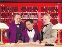  ??  ?? Ralph Fiennes, top, is the concierge and Tony Revolori the central innocent in The Grand Budapest Hotel. Middle: Revolori and Saoirse Ronan. Tom Wilkinson, Revolori and Owen Wilson, at bottom, are part of a star- studded cast in Wes Anderson’s film.