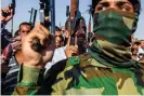  ??  ?? Iraqi men marching to a recruiting centre in west Baghdad in June 2014. Photograph: Ghaith Abdul-Ahad/The Guardian