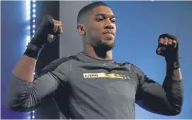  ??  ?? Anthony Joshua at last night’s training session in Cardiff.