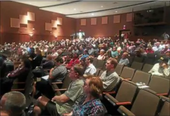  ?? KEVIN TUSTIN – DIGITAL FIRST MEDIA ?? A packed house turned out Monday night for the first official presentati­on of plans to develop the former Don Guanella Village property off Sproul Road.