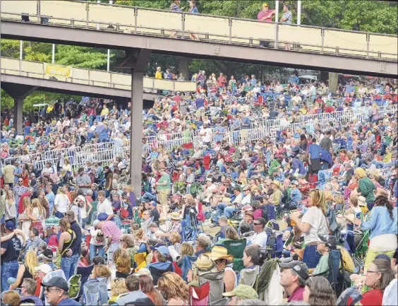  ?? John Carl D’annibale / Times Union archive ?? Fans pack the Saratoga Performing Arts Center for Farm Aid 2013. The pandemic forced SPAC to cancel its entire season last year.