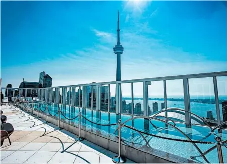  ?? BISHA HOTEL TORONTO ?? The rooftop pool at Bisha Hotel Toronto is a glamorous spot with superb views of the downtown area.