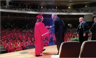  ??  ?? Cherokee High School senior Lucas Jones earned his diploma through the special CHOICE program designed to boost graduation rates for special needs students.