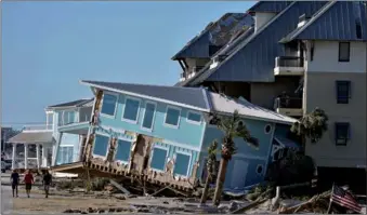  ?? HECTOR RETAMAL / AGENCE FRANCE-PRESSE ?? A view of the damage caused by Hurricane Michael in Mexico Beach, Florida, on Saturday, three days after the storm hammered the area.