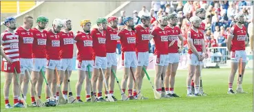  ?? (Pic: George Hatchell) ?? The Cork team stand for the National Anthem in the Munster Senior Hurling Championsh­ip (Round Robin) Round 2 at Páirc Uí Chaoimh.