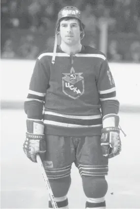  ?? DENIS BRODEUR/NHLI via Getty Images file photo ?? Valeri Kharlamov #17 of the Red Army looks on during the Cold War on Ice game at the
Montreal Forum on Dec. 31, 1975.