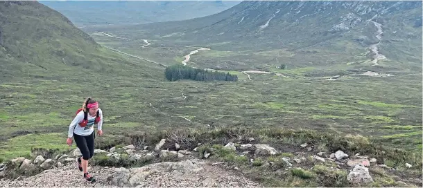  ?? Photograph by Alan Young ?? LEGWORK: Aberdeen athlete Siobhan Killingbec­k pushes herself harder as she tackles the gruelling 95-mile West Highland Way.