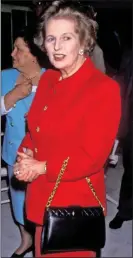  ?? ?? ICONIC: Baroness Thatcher with her trademark black handbag