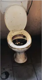  ??  ?? UNSANITARY: A blocked toilet in Joburg’s Moth building. Few toilets are still working in the derelict structure.