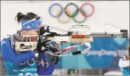  ?? Andrew Medichini / Associated Press ?? The United States’ Clare Egan aims her rifle during a biathlon training session at the Winter Olympics in Pyeongchan­g, South Korea, in 2018. At least 70 percent of U.S. Olympic sports organizati­ons have applied for government loans in the coronaviru­s pandemic, underscori­ng the frailties within the world’s most dominant Olympic sports system.