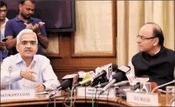  ?? PTI ?? Finance Minister Arun Jaitley (right) and Economic Affairs Secretary Shaktikant­a Das during a Press Conference in New Delhi on Wednesday.