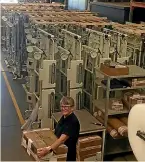  ??  ?? Howard Wright’s Karen Horo with assembled units ready for shipping.