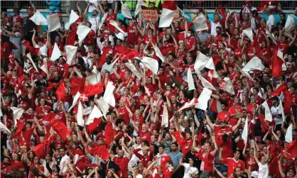  ??  ?? Denmark fans celebrate taking the lead against England at Wembley in their semi-final. Photograph: Paul Marriott/Shuttersto­ck