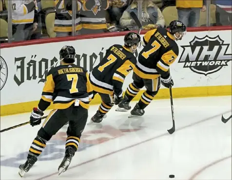  ?? Matt Freed/Post-Gazette ?? SEVENS ARE WILD In honor of Tuesday being Ben Roethlisbe­rger Night at PPG Paints Arena, Penguins players doned No. 7 sweaters for pregame warmups before taking on the New York Rangers.
