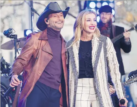  ?? CHARLES SYKES/THE ASSOCIATED PRESS ?? At a time when most country artists are staying mum on controvers­ial topics such as gun control, married couple Tim McGraw and Faith Hill are outspoken — yet they still retain the respect of their fans and peers.
