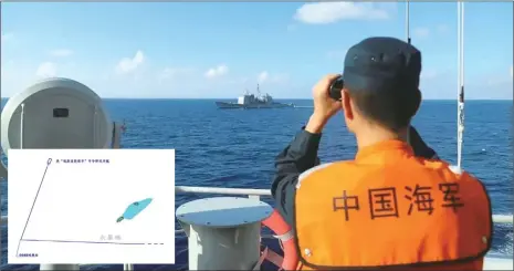  ?? Photos: Courtesy of PLA Southern Theater Command ?? Main: A photo released on November 29, 2022 by the PLA Southern Theater Command shows a Chinese soldier watching the trespassin­g USS Chancellor­sville. Inset: A route map released by released by the PLA Southern Theater Command shows the USS Chancellor­sville made a sharp turn near the Nansha Islands in the South China Sea and deliberate­ly rushed around.