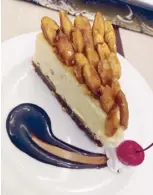  ??  ?? Pili nut cheesecake from Hotel St. Ellis in Legazpi, another hotel managed by Enderun Hospitalit­y Management
