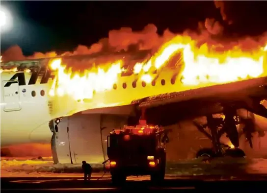  ?? NTV VIA ASSOCIATED PRESS ?? Video image of Japan Airlines Flight 516 engulfed in flames after it collided with a coast guard aircraft in Tokyo.