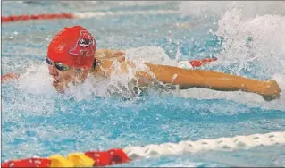  ??  ?? Acadia swimmer Brett Liem competes at the Jack Scholz Swim Meet, where he qualified for the CIS championsh­ip with a winning time of 25.76 in the 50-metre Freestyle. Liem also captured gold in 50m butterfly.