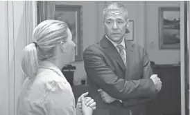  ?? SUE OGROCKI/AP ?? Newly elected Oklahoma state Sen. Michael Brooks talks with Sarah Taylor of the Democratic leadership staff Wednesday during a tour of the State Capitol in Oklahoma City.