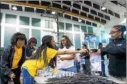  ?? PHOTO BY LINCOLN FIELDS ?? Students from Pine Forge Academy joined with other private schools this weekend, assembling nearly 10,000 care packages for victims of Hurricane Harvey.